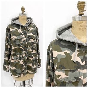 Camo jacket with grey jersey hood.